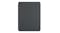 Front view of the black Apple Smart Folio for iPad Pro 13-inch in a closed, flat position Front view of the black Apple Smart Folio for iPad Pro 13-inch in a closed, flat position