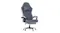 A grey ergonomic office chair featuring a gas lift mechanism, adjustable headrest, lumbar cushion, and an extendable footrest on a wheeled base A grey ergonomic office chair featuring a gas lift mechanism, adjustable headrest, lumbar cushion, and an extendable footrest on a wheeled base
