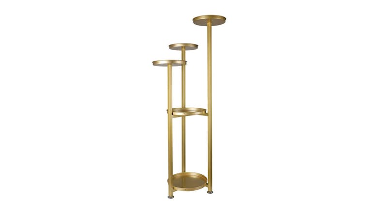A gold metal plant stand with five round tiers at varying heights A gold metal plant stand with five round tiers at varying heights