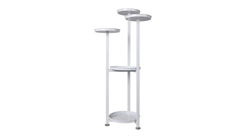 A white metal plant stand with five round tiers at varying heights A white metal plant stand with five round tiers at varying heights