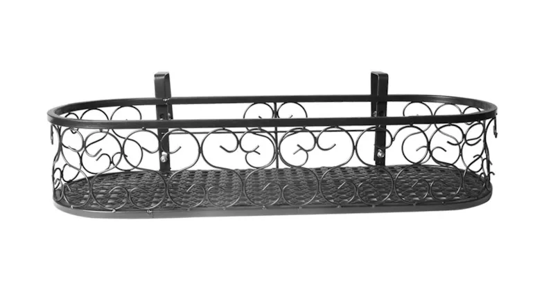 An oval metal hanging plant holder with decorative scrollwork and two brackets for mounting An oval metal hanging plant holder with decorative scrollwork and two brackets for mounting