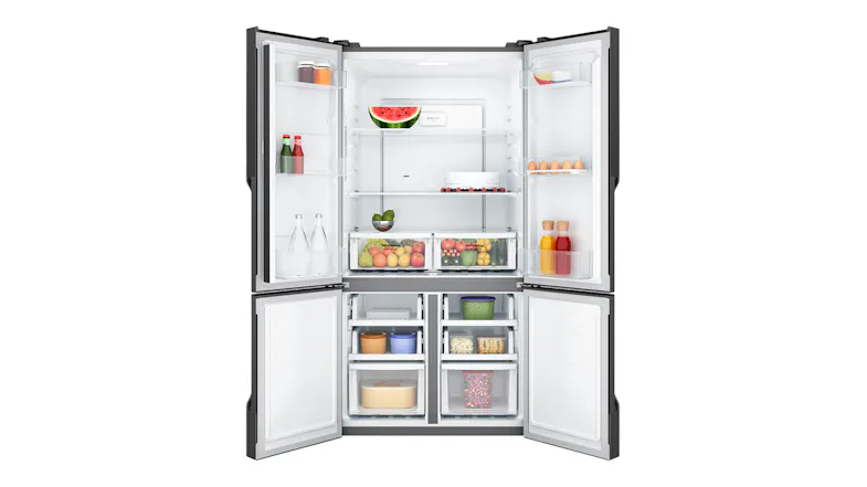The open fridge showing shelves stocked, with the lower drawers filled with frozen items The open fridge showing shelves stocked, with the lower drawers filled with frozen items