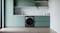 Haier 9.5kg washing machine in a modern kitchen setting Haier 9.5kg washing machine in a modern kitchen setting