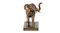 Front view of the gold polyresin elephant bookend showing the elephant’s raised trunk and tusks Front view of the gold polyresin elephant bookend showing the elephant’s raised trunk and tusks