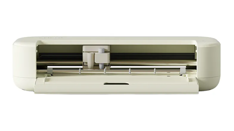An open Cricut Explore 5 machine, showing the cutting carriage, tool holder, and interior workspace An open Cricut Explore 5 machine, showing the cutting carriage, tool holder, and interior workspace