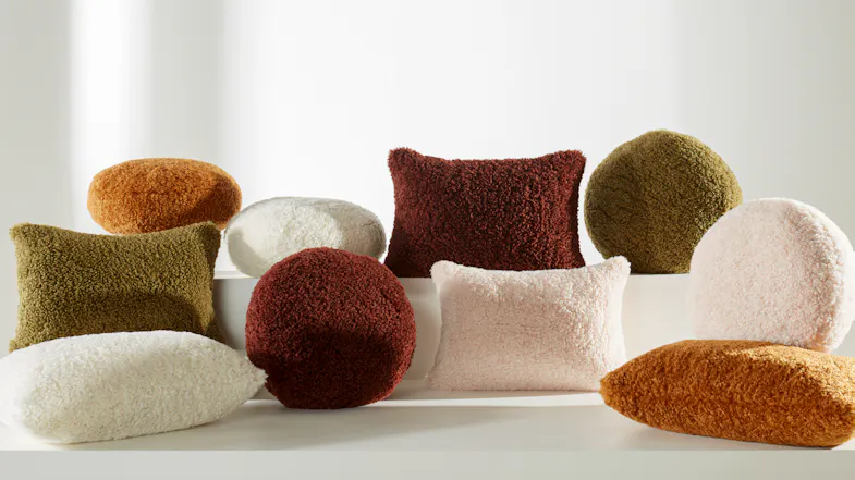 A view of various Shetland Cushions in different colours and shapes A view of various Shetland Cushions in different colours and shapes