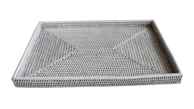 Angled view of a rectangular Stanley White Rattan Tray with a 3cm rim and woven diamond pattern Angled view of a rectangular Stanley White Rattan Tray with a 3cm rim and woven diamond pattern