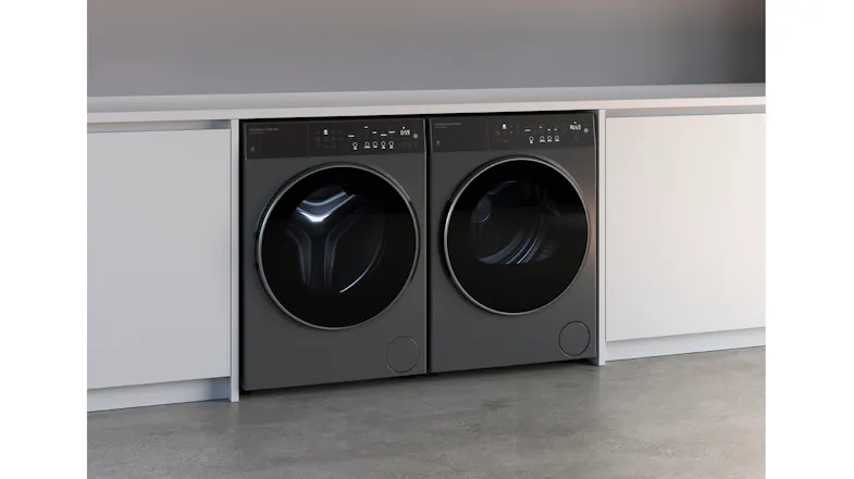 Angled view of laundry appliances in a modern kitchen Angled view of laundry appliances in a modern kitchen