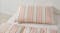 Close-up of the pink and orange vertical stripes on the Linen House Kids cotton pillowcase Close-up of the pink and orange vertical stripes on the Linen House Kids cotton pillowcase