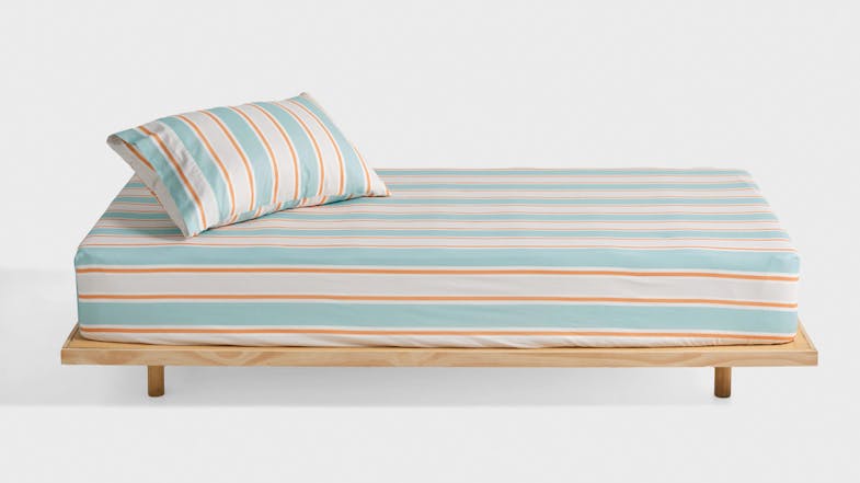 Sailor Stripe Blue Fitted Sheet Set by Linen House Kids on a wooden platform bed Sailor Stripe Blue Fitted Sheet Set by Linen House Kids on a wooden platform bed
