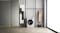 Whirlpool 10kg washing machine in a modern, minimalist laundry room setting Whirlpool 10kg washing machine in a modern, minimalist laundry room setting