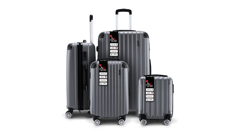 Four grey BUON VIAGGIO hard-shell suitcases of different sizes with labels, displayed upright Four grey BUON VIAGGIO hard-shell suitcases of different sizes with labels, displayed upright