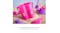 Pink toy bucket in sand featuring glitter vinyl name decal Pink toy bucket in sand featuring glitter vinyl name decal