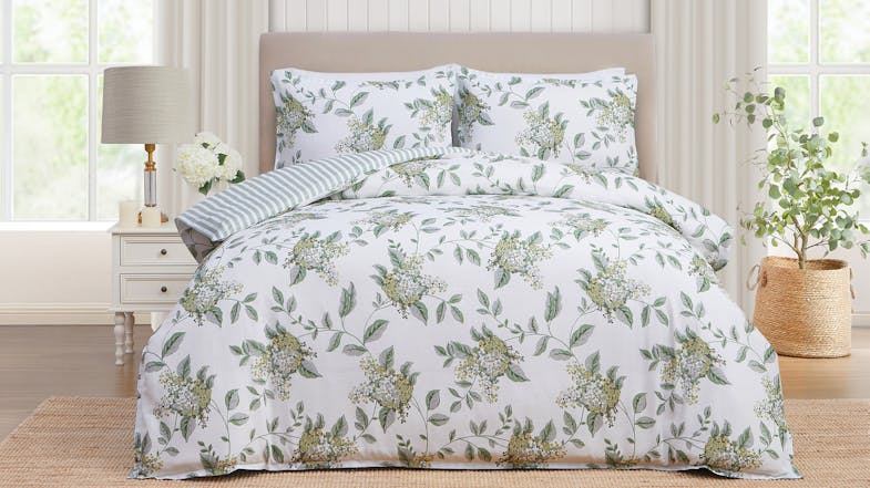 Full view of a Portland Ochre Yellow Duvet Cover Set in a bright, modern bedroom setting Full view of a Portland Ochre Yellow Duvet Cover Set in a bright, modern bedroom setting