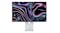 An Apple 27" Studio Display XDR with a vibrant, swirling neon wallpaper An Apple 27" Studio Display XDR with a vibrant, swirling neon wallpaper