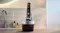Philips cordless shaver resting vertically in a black and silver cleaning pod Philips cordless shaver resting vertically in a black and silver cleaning pod