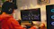 A person using desktop software to adjust the headset equaliser settings A person using desktop software to adjust the headset equaliser settings