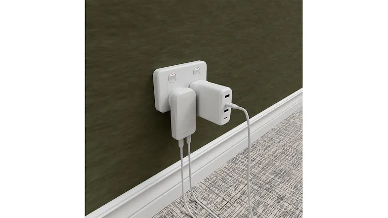 Two white chargers on a wall, showcasing the slim profile of the Cygnett ChargePlus Two white chargers on a wall, showcasing the slim profile of the Cygnett ChargePlus
