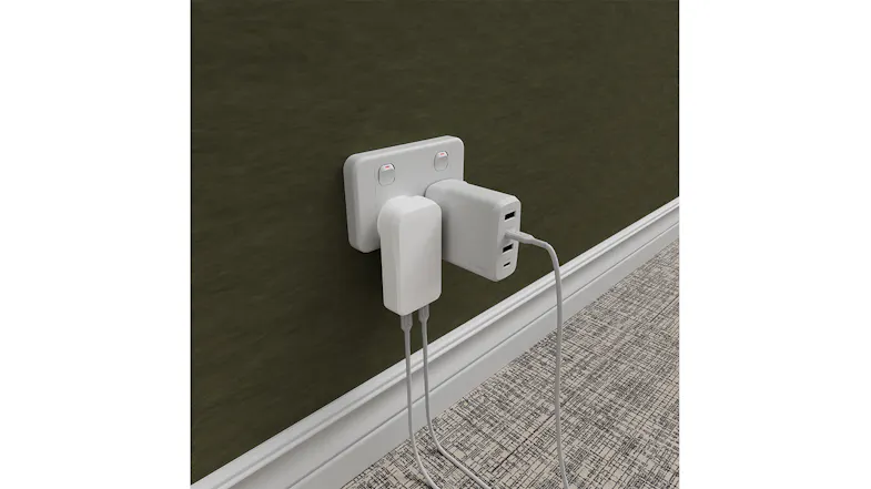 Two white chargers on a wall, showcasing the slim profile of the Cygnett ChargePlus Two white chargers on a wall, showcasing the slim profile of the Cygnett ChargePlus