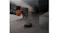 Mova Z60 vacuuming a dark tile floor near a cat and a sofa Mova Z60 vacuuming a dark tile floor near a cat and a sofa