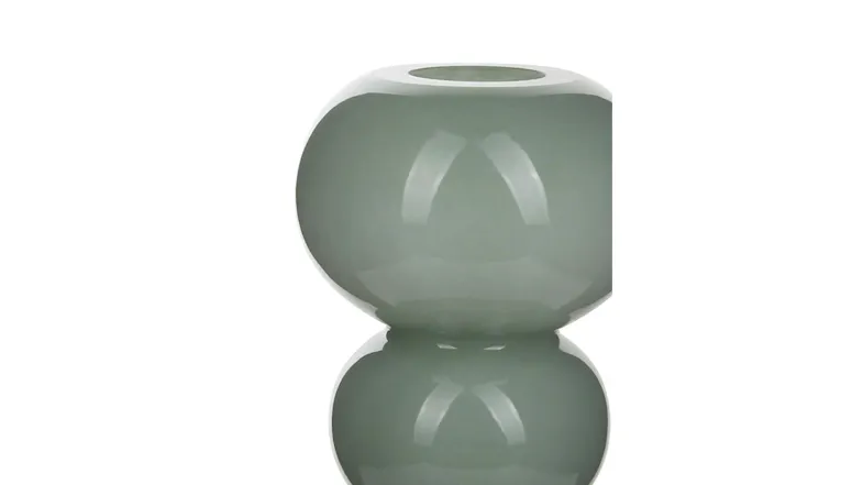 Close-up view of a glass vase with a glossy finish Close-up view of a glass vase with a glossy finish