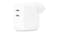 An Apple 35W Dual USB-C Power Adapter in a sleek white colour An Apple 35W Dual USB-C Power Adapter in a sleek white colour