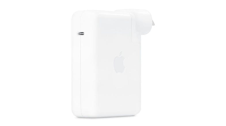 An Apple 140W USB-C Power Adapter in a sleek white colour An Apple 140W USB-C Power Adapter in a sleek white colour