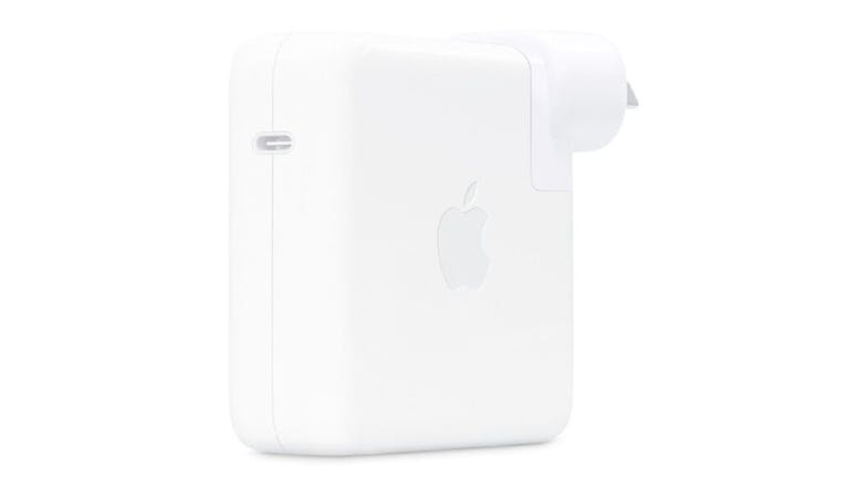An Apple 96W USB-C Power Adapter in a sleek white colour An Apple 96W USB-C Power Adapter in a sleek white colour