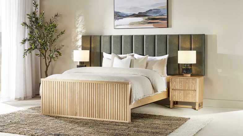 Modern bedroom interior featuring the Akaroa King Upholstered Extended Headboard and natural wood furniture Modern bedroom interior featuring the Akaroa King Upholstered Extended Headboard and natural wood furniture