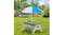 Kids' picnic table with an umbrella displayed in a backyard setting Kids' picnic table with an umbrella displayed in a backyard setting