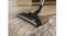 The Electrolux Pet 500 floor nozzle cleaning dust and debris from a light wood floor The Electrolux Pet 500 floor nozzle cleaning dust and debris from a light wood floor