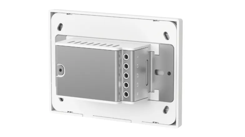 Rear view of a smart light switch mounted in a wall box, showing wiring terminals, metal housing, and mounting screws Rear view of a smart light switch mounted in a wall box, showing wiring terminals, metal housing, and mounting screws