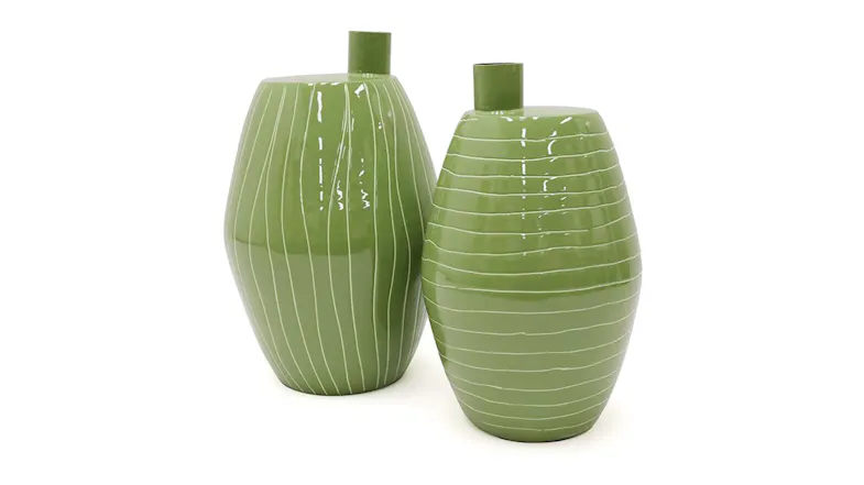 A view of two different-sized novalee metal vases displayed next to each other on a white background A view of two different-sized novalee metal vases displayed next to each other on a white background