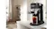 A modern kitchen with a De'Longhi espresso machine A modern kitchen with a De'Longhi espresso machine