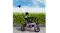 The tricycle displayed outdoors The tricycle displayed outdoors