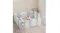 Indoor baby playpen with white and grey panels surrounding a padded play mat and toys in a modern home setting Indoor baby playpen with white and grey panels surrounding a padded play mat and toys in a modern home setting