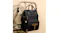 A view of the nappy bag attached to a stroller A view of the nappy bag attached to a stroller