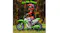 Young rider wearing a helmet riding a green electric dirt bike outdoors with “It’s Go Time!” text above Young rider wearing a helmet riding a green electric dirt bike outdoors with “It’s Go Time!” text above