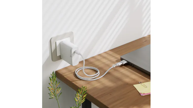 MacBook being charged on a wooden desk using the 2m Alogic SnapSafe magnetic USB-C to MagSafe cable MacBook being charged on a wooden desk using the 2m Alogic SnapSafe magnetic USB-C to MagSafe cable