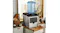 An ice maker is placed on a kitchen counter with decor and baked goods around it An ice maker is placed on a kitchen counter with decor and baked goods around it