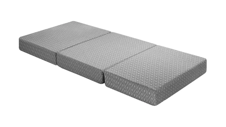 Grey Luxdream tri-fold mattress fully laid flat with a diamond-patterned cover Grey Luxdream tri-fold mattress fully laid flat with a diamond-patterned cover