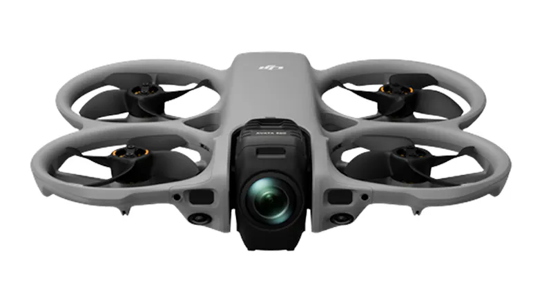 Eye-level front view of a grey drone with a large camera lens Eye-level front view of a grey drone with a large camera lens