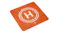 An orange square landing pad features a white circle and the letter H An orange square landing pad features a white circle and the letter H