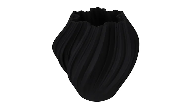 Modern black Amelie ceramic vase showing a textured twist pattern and unique jagged rim detail Modern black Amelie ceramic vase showing a textured twist pattern and unique jagged rim detail
