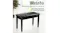 The black piano bench displayed in a bright room setting, highlighting stability and comfort The black piano bench displayed in a bright room setting, highlighting stability and comfort