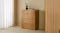 Resonance 4 Drawer Tallboy in a light oak finish standing against a neutral wall Resonance 4 Drawer Tallboy in a light oak finish standing against a neutral wall