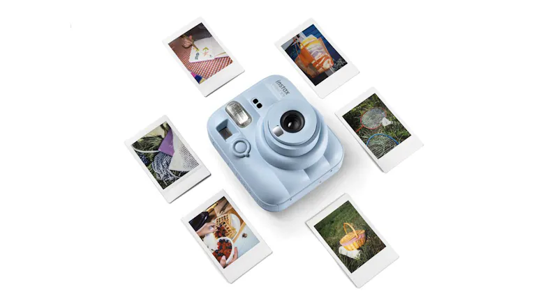Instax Mini camera surrounded by six square photos Instax Mini camera surrounded by six square photos
