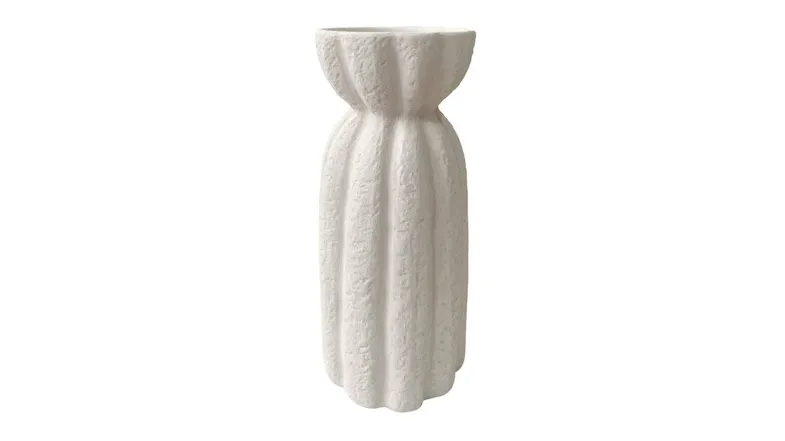 A tall white stoneware vase with a textured surface, fluted vertical ridges, and a cinched, hourglass-like shape A tall white stoneware vase with a textured surface, fluted vertical ridges, and a cinched, hourglass-like shape