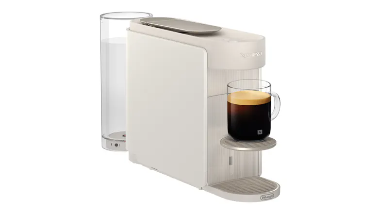 Angled view of the Espresso machine with a mug of coffee Angled view of the Espresso machine with a mug of coffee
