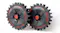 Close-up of two rugged, all-terrain replacement wheels with red hubs Close-up of two rugged, all-terrain replacement wheels with red hubs